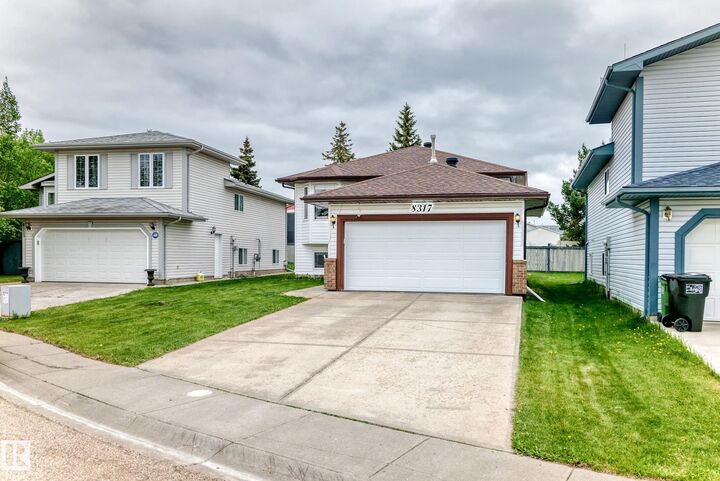 Property Photo:  8317 160A Avenue NW  AB T5Z 3G4 