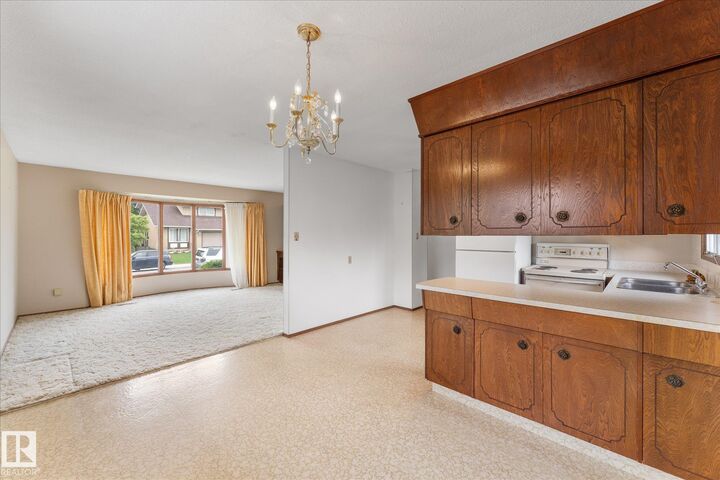 Property Photo:  11008 162A Avenue NW  AB T5Z 3X5 