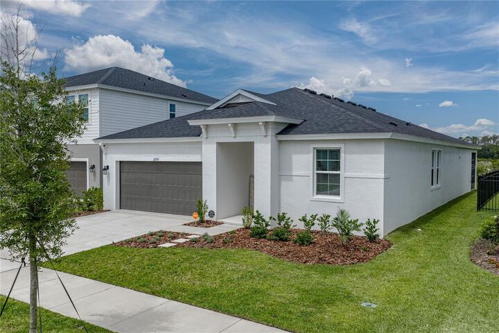 Property Photo: 12253 Cattleside Drive FL 33579