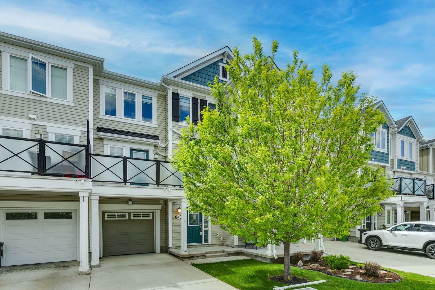 Property Photo:  321 Windstone Gardens SW  AB T4B 3R5 