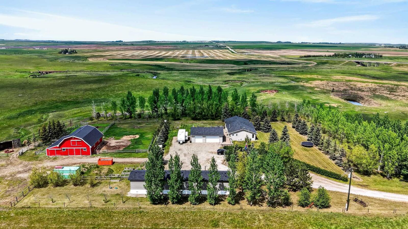 Property Photo:  254052 Hwy 21  AB T1P 0K7 
