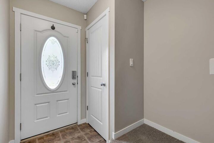 Property Photo: 401 Copperpond Landing SE AB T2G 1Z6