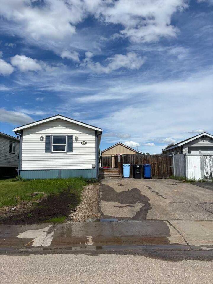 Property Photo: 120 Hunter Street AB T9K 2K6