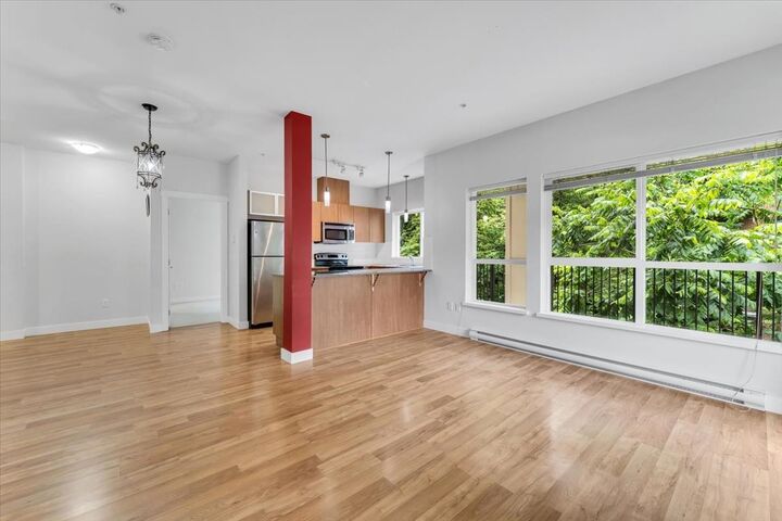 Property Photo: 9655 King George Boulevard 215 BC V3T 0C7