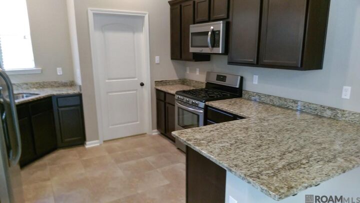 Property Photo:  8655 Abertay Ave  LA 70820 