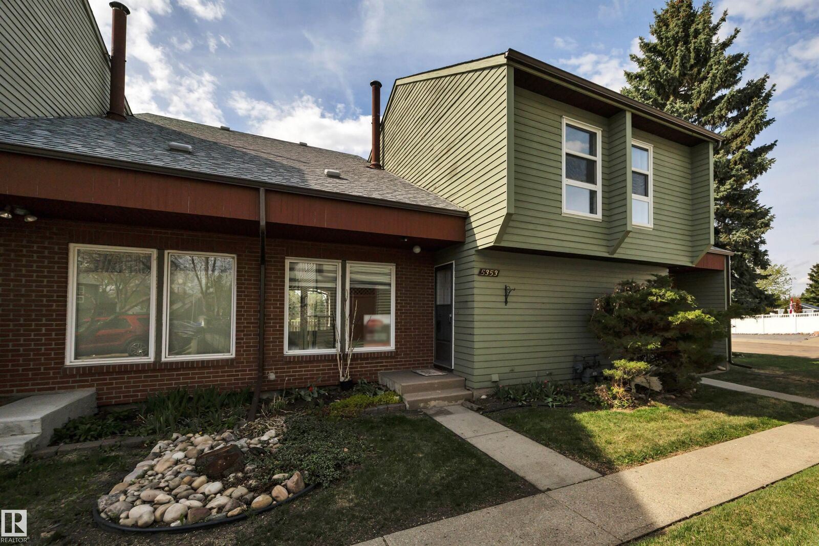 Property Photo: 5353 Hill View Crescent NW AB T6L 1V9
