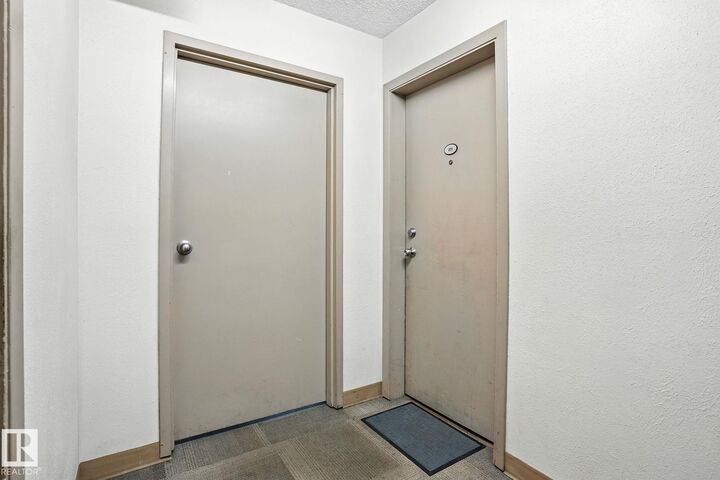 Property Photo:  11046 130 Street NW 201  AB T5M 0Z7 