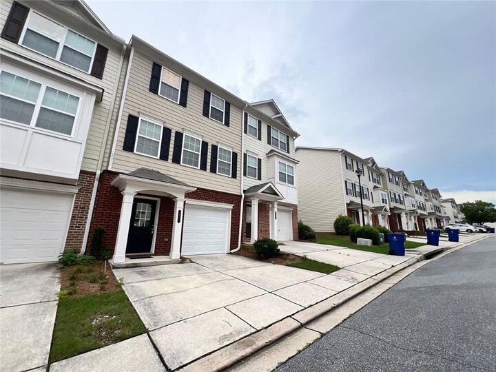 Property Photo: 6877 Slate Stone Way SE GA 30126