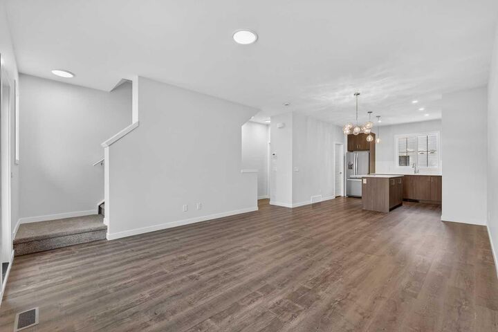 Property Photo: 40 Creekside Way SW 105 AB T2X 6E2
