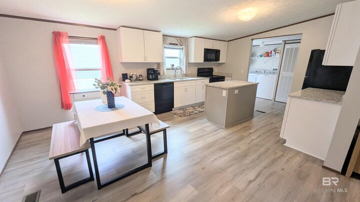 Property Photo: 1393 Ridgewood Drive AL 36549