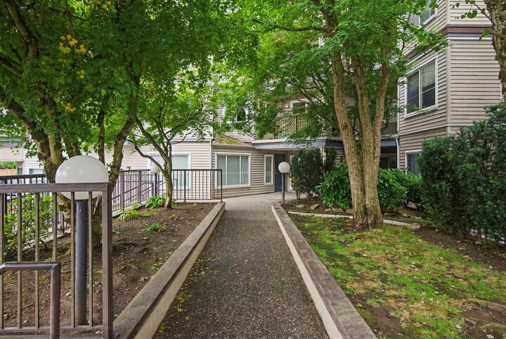 Property Photo: 5759 Glover Road 207 BC V3A 8M8