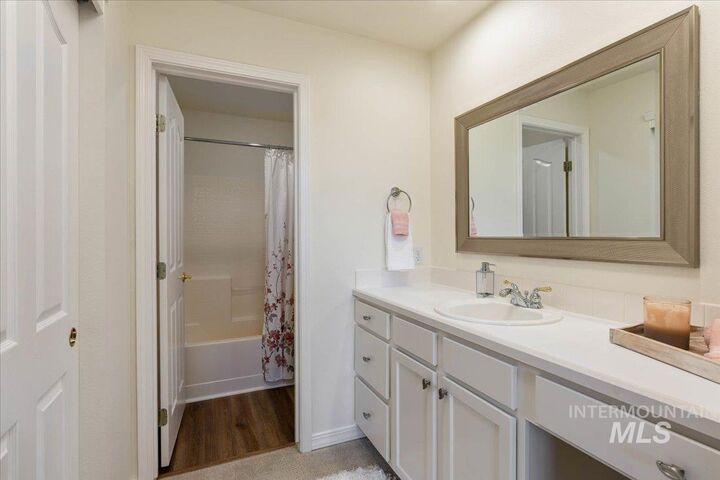 Property Photo:  5110 S Surprise Way 203  ID 83716 