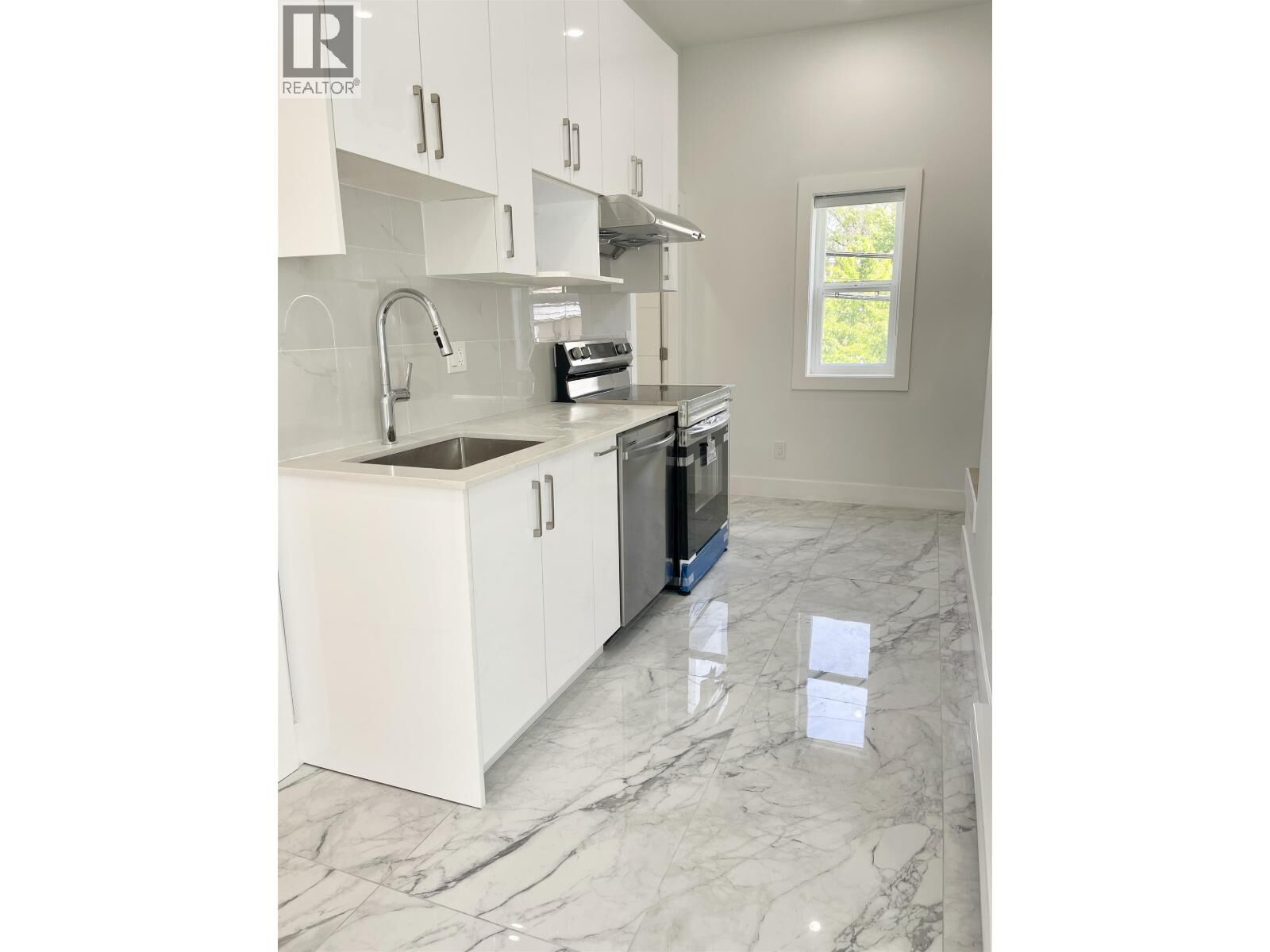 Property Photo:  6560 Fleming Street B1  BC V5P 3H2 