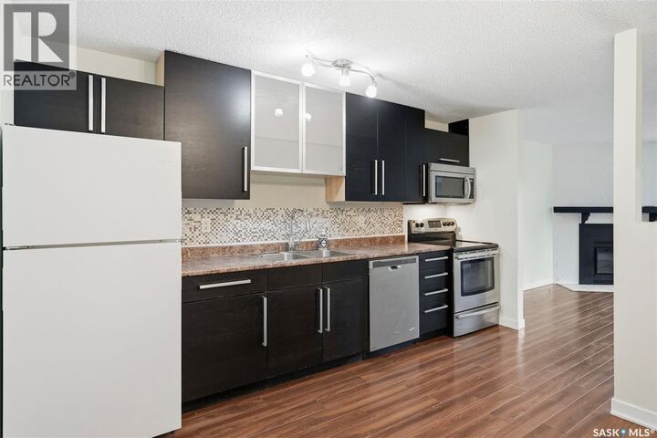 Property Photo:  306 536 4th Avenue N  SK S7K 2M7 