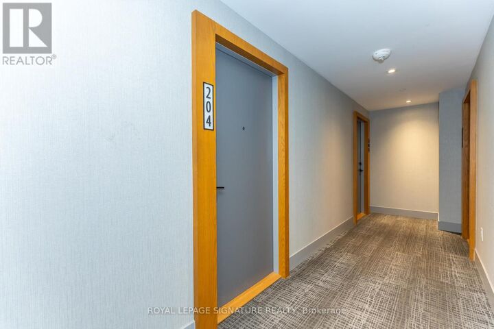 Property Photo:  1888 Queen Street East 204  ON M4L 1H4 