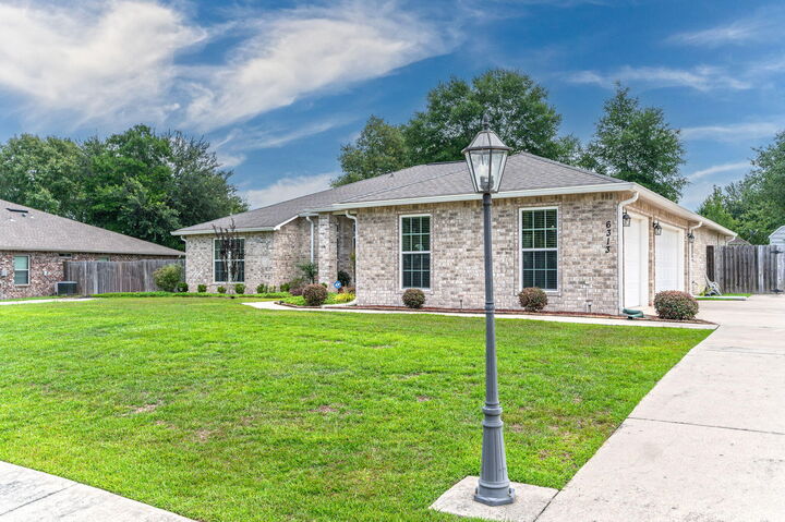 Property Photo:  6313 Antigone Circle  FL 32536 