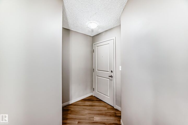 Property Photo:  11441 Ellerslie Road SW 211  AB T6W 1S9 