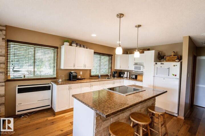 Property Photo:  104 60201 Rng Rd 122  AB T0A 0N0 