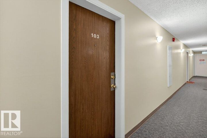 Property Photo:  10620 104 Street NW 103  AB T5H 2W2 