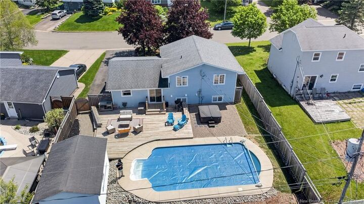Property Photo: 115 Highmeadow Drive NB E1G 2B8