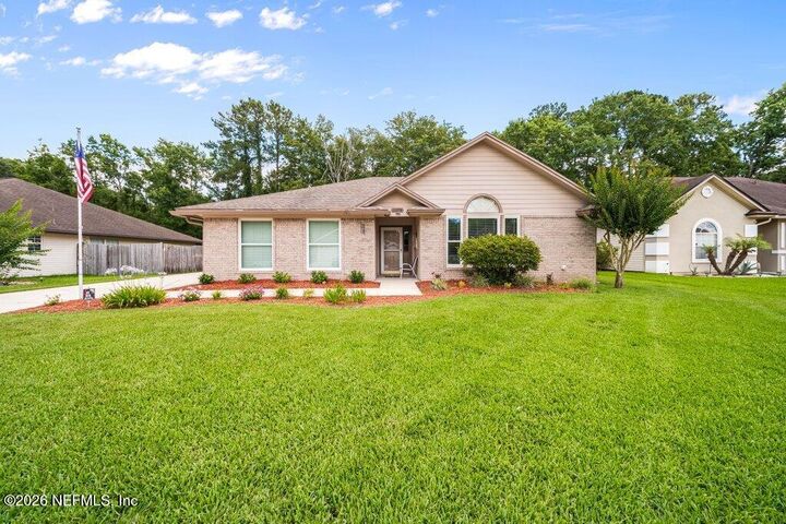 Property Photo: 11579 Greenland Hideaway Drive E FL 32258