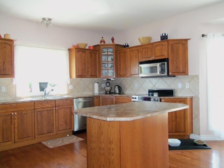 Property Photo:  10330 83 Street  AB T8S 1X9 