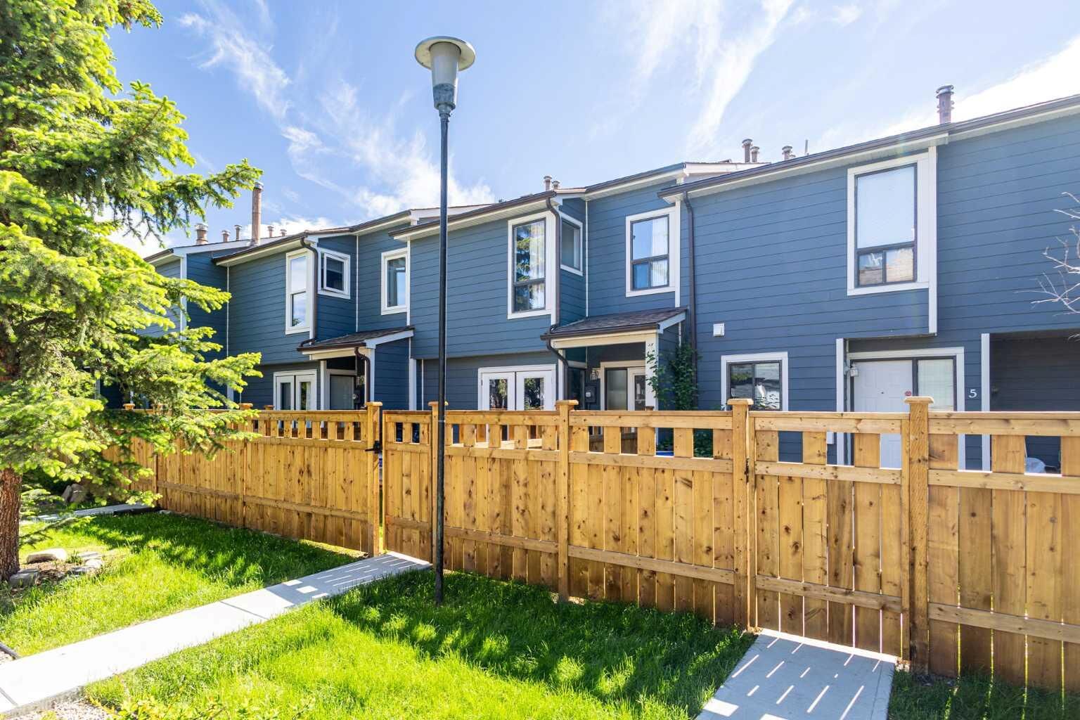 Property Photo:  203 Grier Terrace NE 4  AB T2K 5Y7 