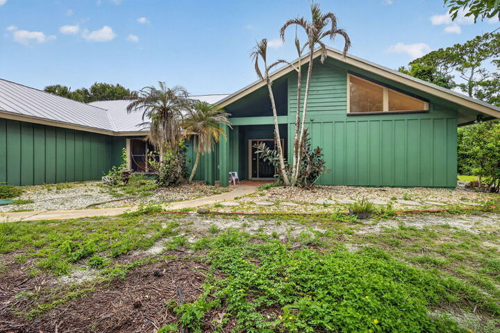 Property Photo: 2111 SW Racquet Club Drive FL 34990