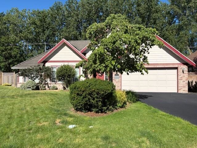 Property Photo:  5209 Glen Abbey Place  BC V4M 4H1 