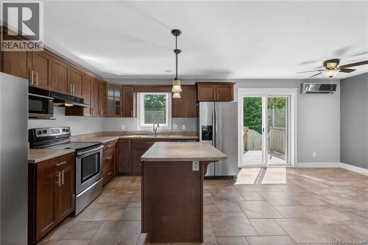 Property Photo: 57 Whisperwood Drive NB E1G 0P7