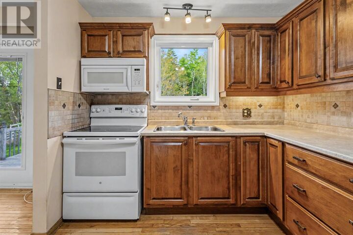 Property Photo: 70 Mackenzie Drive NS B1R 2H2