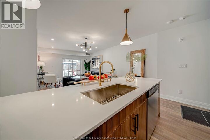 Property Photo:  11957 Tecumseh Road East 204  ON N8R 1L0 
