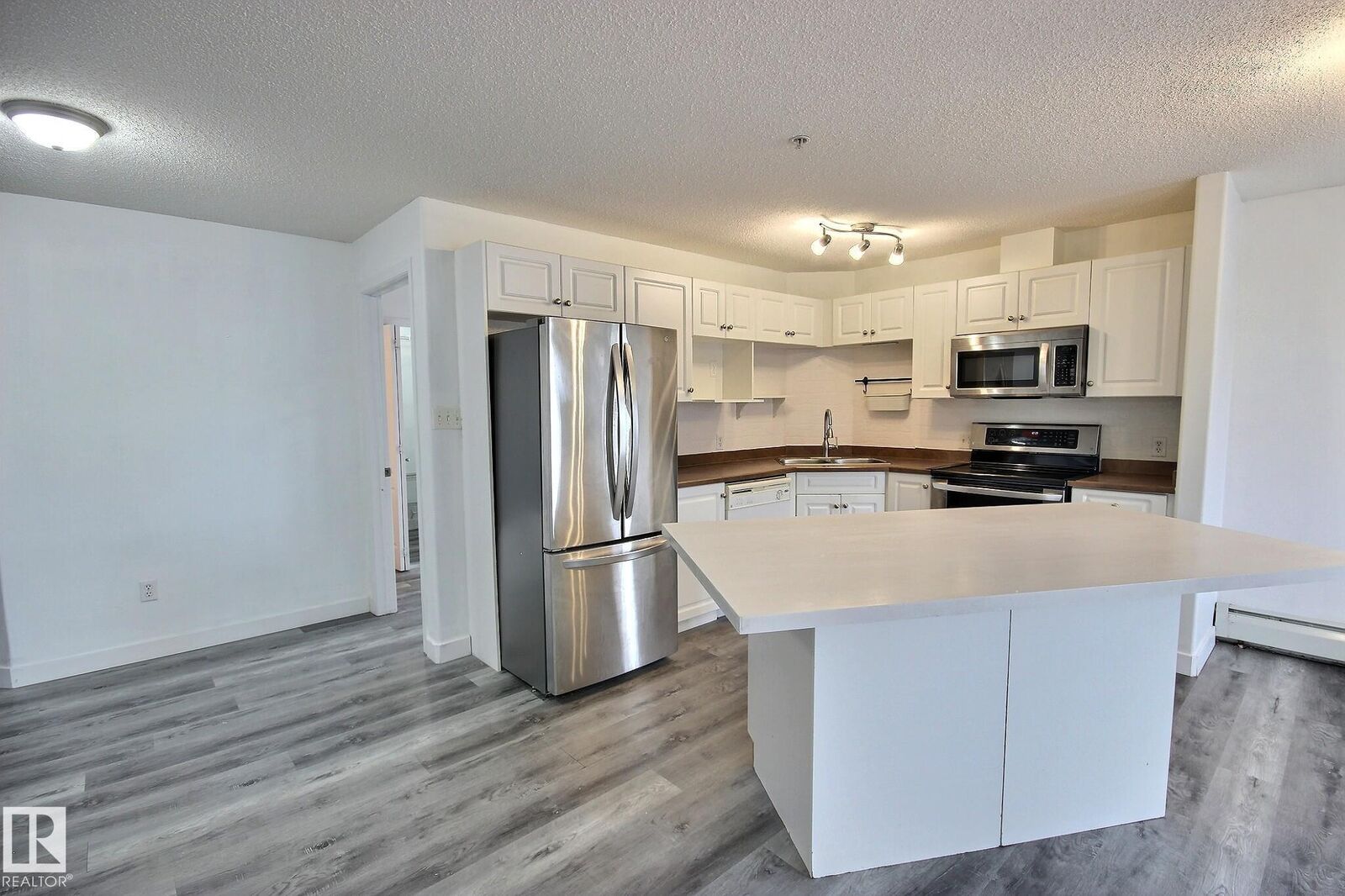 Property Photo:  111 Edwards Drive SW 222  AB T6X 0C4 