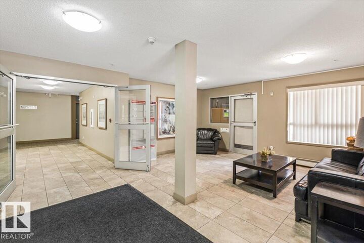 Property Photo:  17003 67 Avenue NW 218  AB T5T 6Y5 