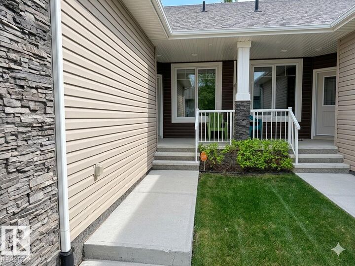 Property Photo: 7115 Armour Link Link SW 2 AB T6W 2V2