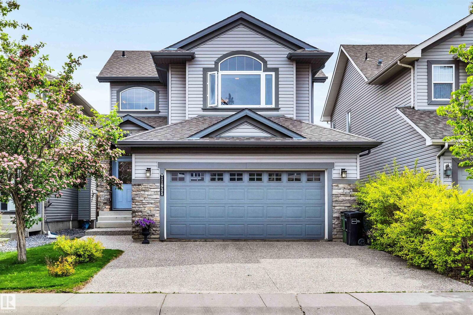 Property Photo:  11935 21 Avenue SW  AB T6W 0C8 