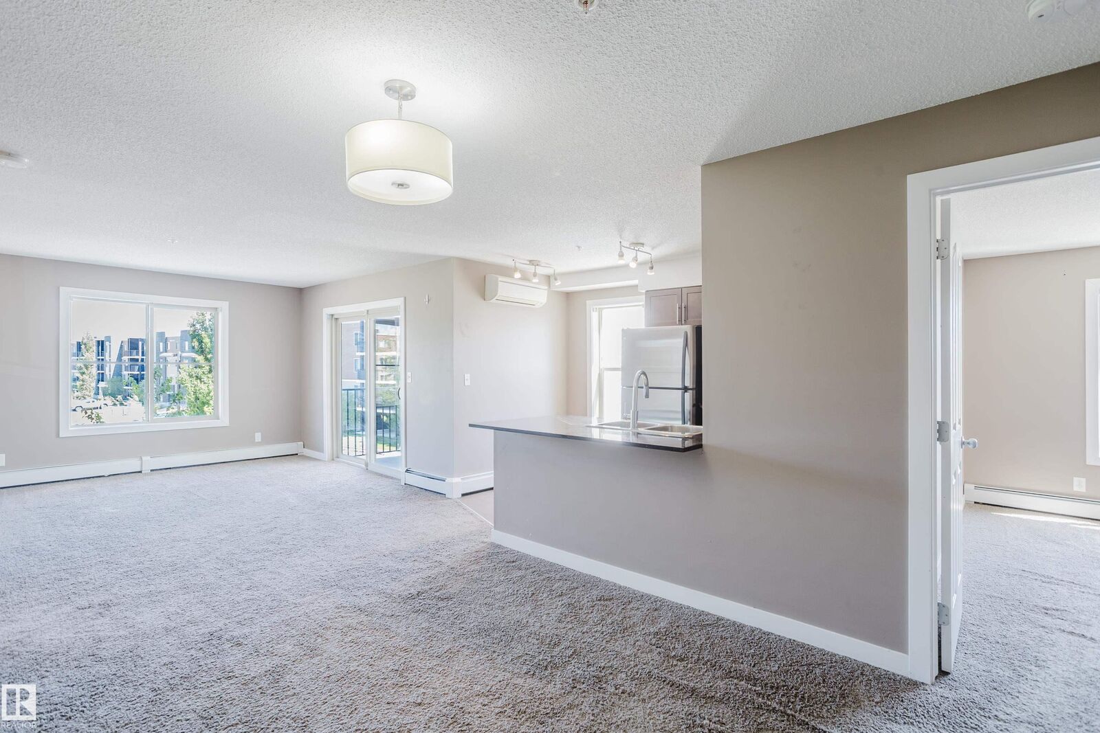 Property Photo: 11820 22 Avenue SW 301 AB T6W 2A2