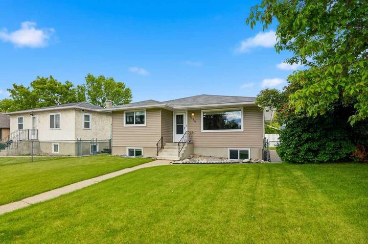 Property Photo:  7428 23 Street SE  AB T2C 0X9 
