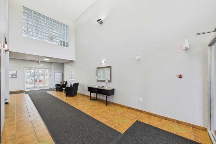 Property Photo:  5590 45 Street 105  AB T4N 7C4 