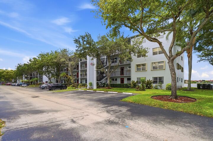 Property Photo:  1401 SW 134th Way 410C  FL 33027 