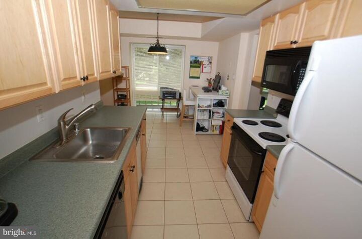Property Photo:  10223 Valentino Drive 7314  VA 22124 