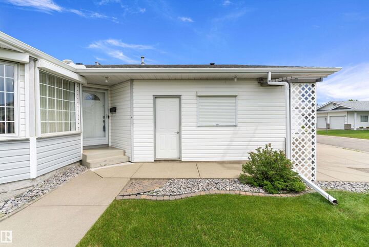 Property Photo: 15577 59A Street NW AB T5Y 2M8