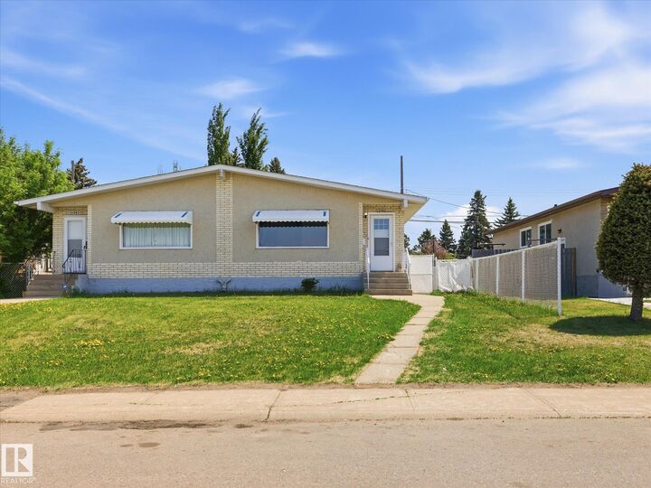 Property Photo: 13343/13345 60 Street NW AB T5A 0S5