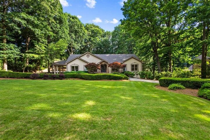 Property Photo:  8920 Huntcliff Trce  GA 30350 