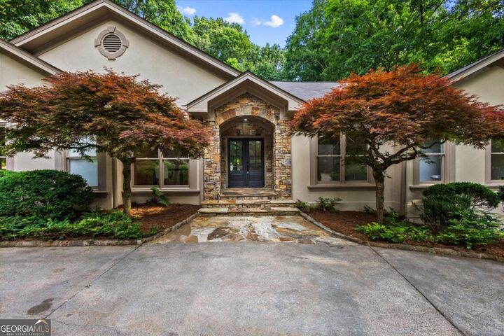 Property Photo:  8920 Huntcliff Trce  GA 30350 