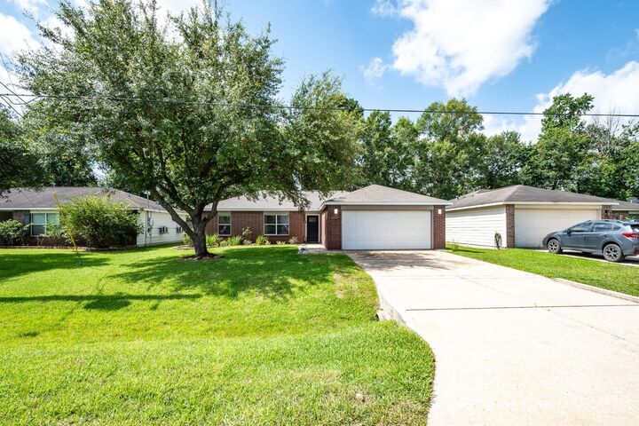 Property Photo: 16392 Many Trees Lane TX 77302