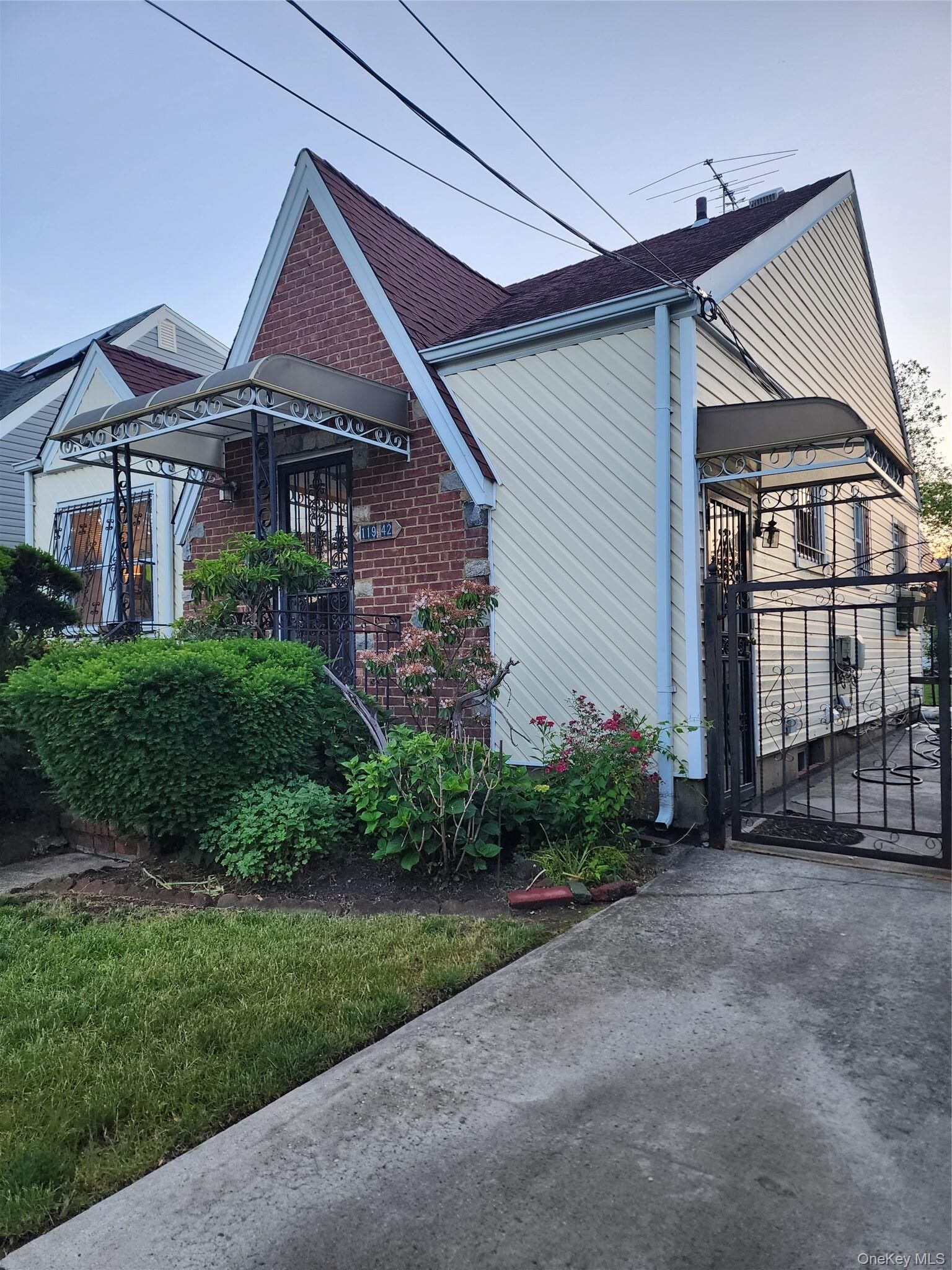 Property Photo:  11942 238th Street  NY 11411 