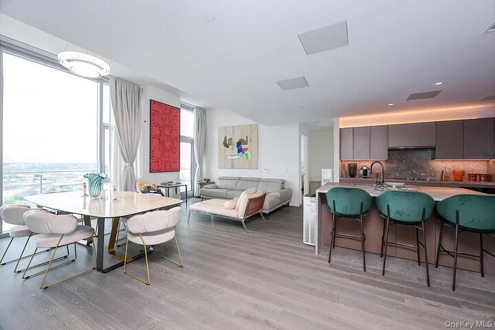 Property Photo:  133-36 37th Avenue Ph3b  NY 11354 