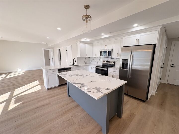 Property Photo:  441 Washington St 203  MA 02026 