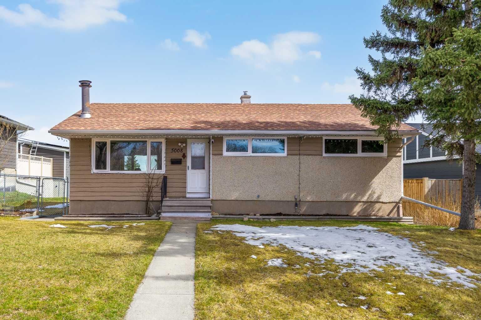 Property Photo: 5008 2 Street NW AB T2K 0Z3